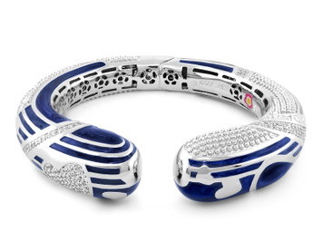 This stunning Sweetheart rhodium plated bangle bracelet with navy enamel and pave stripes and hearts.  Hinged bangle bracelet arrives beautifully packaged. Arrives with Manufacturer's warranty. Matching Magic 8 Ball earrings available.  
