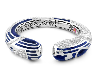 This stunning Sweetheart rhodium plated bangle bracelet with navy enamel and pave stripes and hearts.  Hinged bangle bracelet arrives beautifully packaged. Arrives with Manufacturer's warranty. Matching Magic 8 Ball earrings available.  