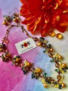 Citrine multi colored crystals
Pearls  
Fish Eye hook earrings -1.5" length (3.8 cm)
Necklace adjustable chain length - 2 1/4"
Necklace Length 10" (25.4 cm)
Ships USPS Tracking 
 