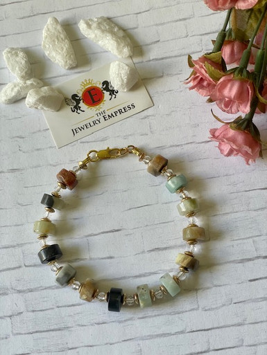 Amazonite Cylinder Beads & Crystal Fashion Bracelet

8" length
Gold Tone Accents
Secure Lobster Clasp 
Geniune Amazonite Stones - multi color stones
Crystal Spacer Beads
Quality Exceptional
Beautifully packaged in a jewelry pouch 

Ships with USPS secure tracking 

Satisfaction Guaranteed