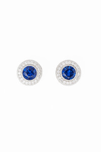 You will feel like a "Royal" when you wear these gorgeous Sapphire and White dazzling Cubic Zirconia earrings set in 925 Sterling Silver. 