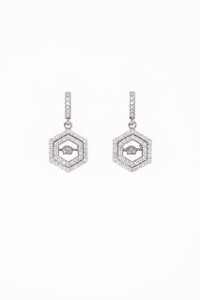  These 925 Sterling Silver pierced earrings flicker with white CZs and dance from the center of octagon dangle.