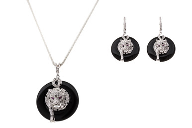 Panther Crazy?  The 925 Sterling Silver pendant and earring set with Black/ White and Ruby Red CZ's in a panther design is surely going to make a statement. T Sold with 20' Sterling Silver chain. Arrives beautifully packaged. 