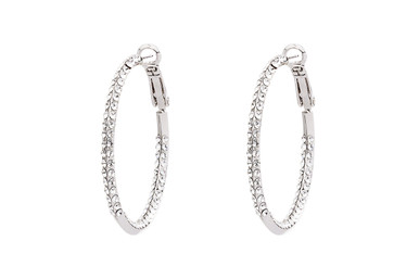 Encrusted 1-1/2" diameter Silver-tone Hoops made with Swarovski elements, Crystals inside hoop and out, lead nickel free & cadmium compliant. Also available in gold tone. Beautifully packaged with gold tissue in a gorgeous organza bag ready for giving or for the wonderful you!