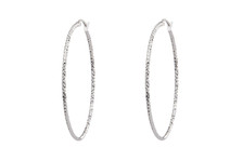 Sterling Silver  2"  Hoop Earrings.  The diamond cut pattern reflects light that adds sparkle and elegance. light weight, comfortable and easy to wear. 