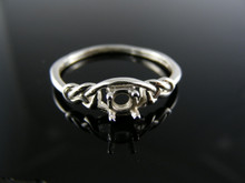 5764 LOVE KNOT RING STERLING SILVER , 4.5MM ROUND STONE SIZE 9