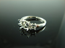 5769 STERLING SILVER RING SETTING, 1 - 7 MM & 2 - 4 MM ROUND GEMSTONE, SIZE 8.5