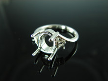 6163 Ring Setting Sterling Silver Size 5.5, (1)10x8 Cab Oval (2)2.5mm Round Gemstones