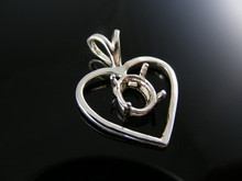P22  PENDANT SETTING STERLING SILVER HEART, W/ 9X7 M M OVAL STONE