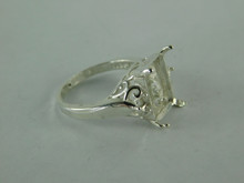 6559   Sterling Silver Ring Setting, 14x10 mm Emerald (w/clipped corners) and (2) 3 mm Round Faceted Stones, Size 8