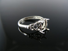 3395  RING SETTING STERLING SILVER, SIZE 6, 7X5 MM EMERALD STONE