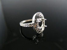 1975  RING SETTING STERLING SILVER, SIZE 5.75, 7X5 MM OVAL STONE