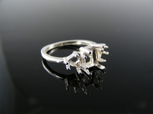 2890  RING SETTING STERLING SILVER, SIZE 6, 1 7X5 MM EMERALD, 2 5X5 MM TRILLION STONE