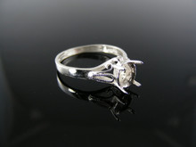 5648 RING SETTING STERLING SILVER, SIZE 6, 7X5 MM OVAL STONE