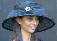 Black Whimsical Brooch Hat for the Kentucky Derby.