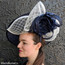 Navy and White Spectator Dish Fascinator worn forwards