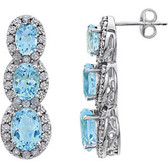 14kt White Sky Blue Topaz & .07 CTW Diamond 3-Stone Earrings