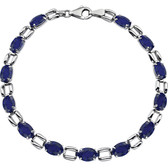 14kt White 7x5mm Oval Blue Sapphire 7" Bracelet