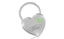 Ford Heart Shape With 2 Green Crystals In A Black Gift Box. Embellished With Dazzling Crystals