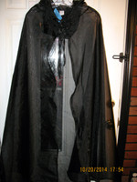 Cheer Black Cape with the hood flipped to the front so you can see it.
