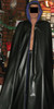 Reversible Pleather and Peachskin Cape with Working Hood, button with chain closures in front, and armholes. Model is 6'4" tall.