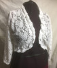 Lovely White Stretch Lace Shrug to finish off your outfit  with an elegant touch. Or add a touch of warmth, if needed.