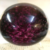 Hand blown purple glass paperweight with bubbles