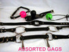 Top three gags may vary from the picture depending on what our suppliers have at the time. The rubber O may not be available until we find a new supplier for the rubber rings. The rubber bit gag in the center is pliable rubber with a flexible metal core, as does the "Half Cheek" Gag below it.