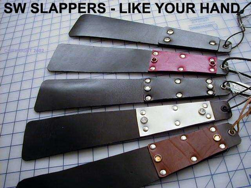 Daily Slapper in a variety of Handle and Jewel colors. They are generally made with one layer of black leather in the center, and are not sewn.