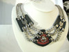 Crown Jewels Collection, with Red Leather overlay on front piece, with Post and D (slave version), and Pirate Lock Charms