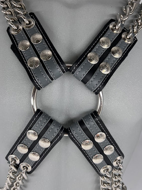 Double chain harness with double stripes on black leather.
Extra Small - Extra Large. Stripe colors are available in black, blue, gray, red, white and yellow.