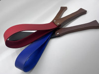  Leather with wood handle slapper. Available in Black, Blue, Natural, Purple, Red, White and Yellow leather.