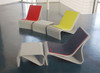 Sponeck Chairs and Table Footrests (Fiber cement in gray finish with optional felt covers)