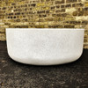 Mill Stone 36" Cocktail Table (Fiberglass resin and aggregate  in white stone)