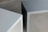 Waterfall Dining Table Detail (Fiberglass resin and aggregate in white stone and gray stone finishes)