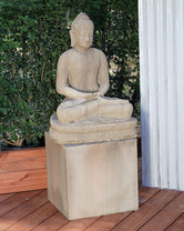 Sitting Buddha Statue(shown on a pedestal) - Material : GFRC - Finish :  Sierra