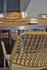 MEIKA Wicker Dining Armchair (Detail) - Stainless Steel (hairline finish), Synthetic Wicker Weaving (honey)