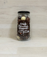 I make chocolate disappear! What's your super powers?
Assorted chocolate coated bullets, nuts, fruit, malt balls and jellies. 
Australian made.
Novelty chocolate gift. 