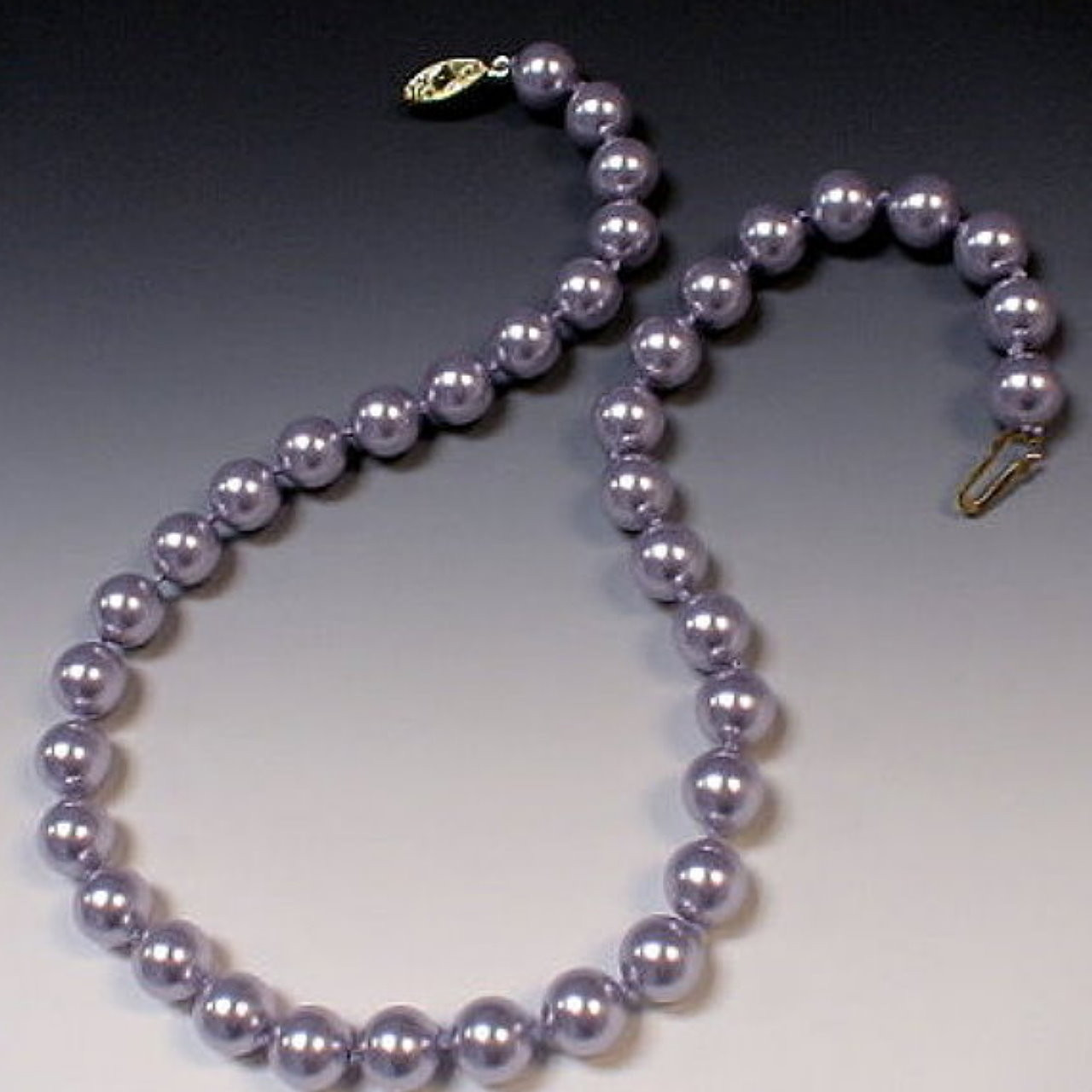 The Art of Pearl Knotting in Jewelry-Making: Enhancing Pearls' Natural