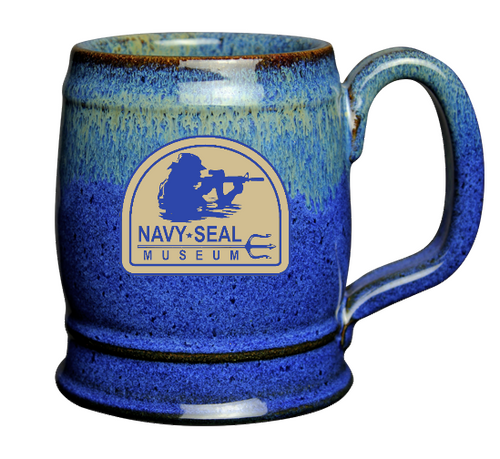  This beer mug has a traditional shape in a versatile size. Handcrafted in Wisconsin — 16 oz; 4.375″h. Dishwasher, microwave and oven safe. Ounces may vary. Due to the nature of the handmade process, styles and glazes will vary.