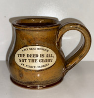  The Deed is All, Not the Glory - The true essence of Navy SEAL honor. 

 There is nothing average about this mug. Its shape is so versatile that it can fit any situation, from social events to tea on the deck. Skillfully handcrafted in Wisconsin — 10 oz; 3.75″h. Dishwasher, microwave and oven safe. 100% lead-free. FDA and California Proposition 65 compliant
