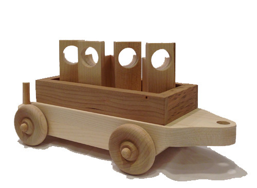 The flat car carries four wooden cargo designed to be easily captured and lifted by the crane and is designed to follow our Crane Car down the line. The flat car is 12" long x 4" wide.