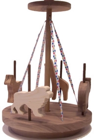 For little girls and boys, our merry go round includes a horse, elephant, giraffe and lion. The colorful ribbon and ingenious design cause it to "go round" with a toddler's help. Crafted out of oak, cherry, birch and walnut. The merry go round is 10" wide x 14" high