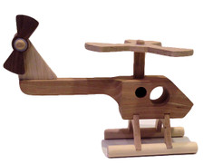Not all our toys are for fans of yesterday. Our twenty-first century helicopter has a sleek, modern design, with a functioning whirling rotor blade and spinning tail rotor. Crafted out of cherry, maple, walnut and oak. The helicopter is 7" long x 2" wide x 5" high.