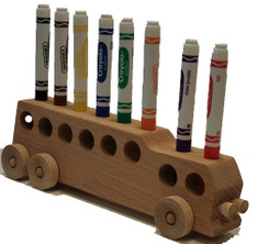 Our school bus cleverly holds eight markers upside down, so they won't dry out or be misplaced. The bus is 11" long x 3" high x 2" wide and sits nicely on a desk. We craft it in maple or oak and give you the markers, too. The school bus is a popular gift for bus drivers, teachers, and college students, as well as the younger set.