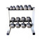 CAP Barbell Solid Hex Dumbbells featured on a rack 