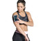 Model changing music with the CAP Barbell Arm Band for Smartphones and MP3 Players