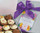 6840 16 Cupcake style Chocolates made from Belgian Chocolates in a silver box with tag