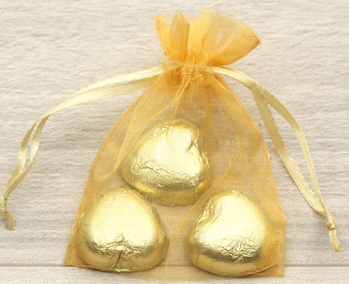 Organza Bags in gold for wedding favours or table gifts for company events, birthday parties or other celebrations