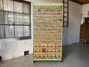 Antique Green and Yellow Hardware Store Parts Cabinet